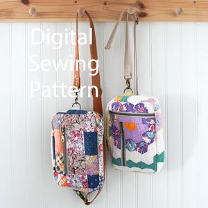 Puede incluir: Dos bolsos de tela acolchada con cierres de cremallera y correas ajustables cuelgan de un perchero de madera. Los bolsos presentan diseños de patchwork en varios colores y patrones. El texto "Digital Sewing Pattern" está superpuesto en la imagen.