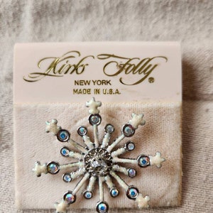 Retired Kirks Folly silver toned snowflake pin/brooch