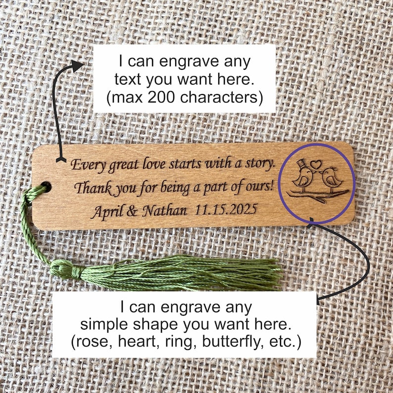 May include: Wooden bookmark with a green tassel. The bookmark is engraved with the text "Every great love starts with a story. Thank you for being a part of ours! April & Nathan 11.15.2025". The bookmark also features a small engraved image of two birds on a branch.