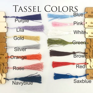 May include: A chart showing different colors of tassels with the text "TASSEL COLORS" at the top. The colors are: purple, lila, gold, silver, orange, rose, navyblue, blue, pink, white, green, brown, red, and saxblue.