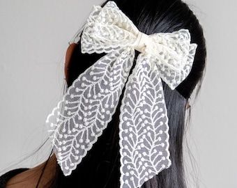 Pinza para el pelo con lazo de encaje: un elegante accesorio para el pelo de novia