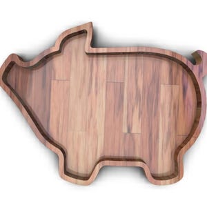 K&ouml;nnte beinhalten: Ein Serviertablett aus Holz in Form eines Schweins. Das Tablett ist aus hellbraunem Holz mit nat&uuml;rlicher Maserung.