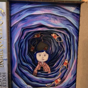 May include: A layered art piece depicting a young girl in a pink coat and blue hair, surrounded by a swirling blue tunnel. Animated mice in red coats are suspended in the air. The artwork is framed in a dark brown border.