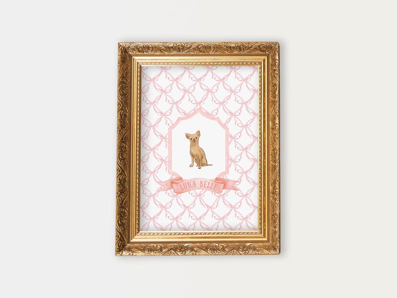 May include: A framed print with a pink and white pattern featuring a small brown chihuahua dog in a pink and white frame. The print has the text "Luna Belle" on a pink ribbon.