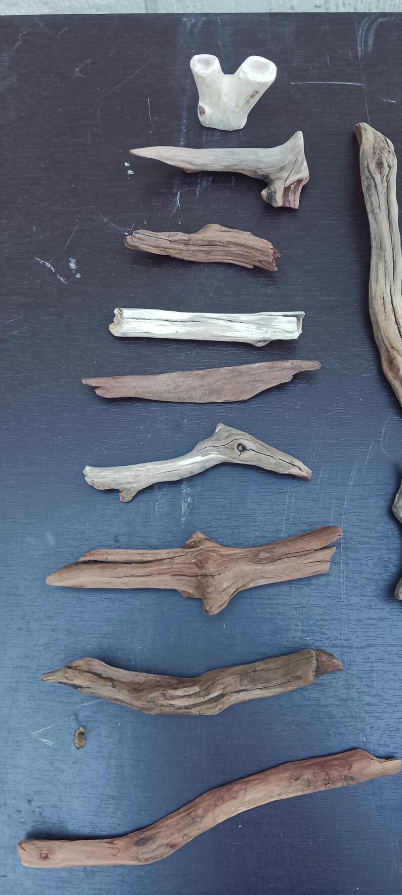 May include: A rustic wooden sign with the text "Welcome to our porch" in white lettering. The sign features a distressed finish and a simple, inviting design, perfect for outdoor decor.