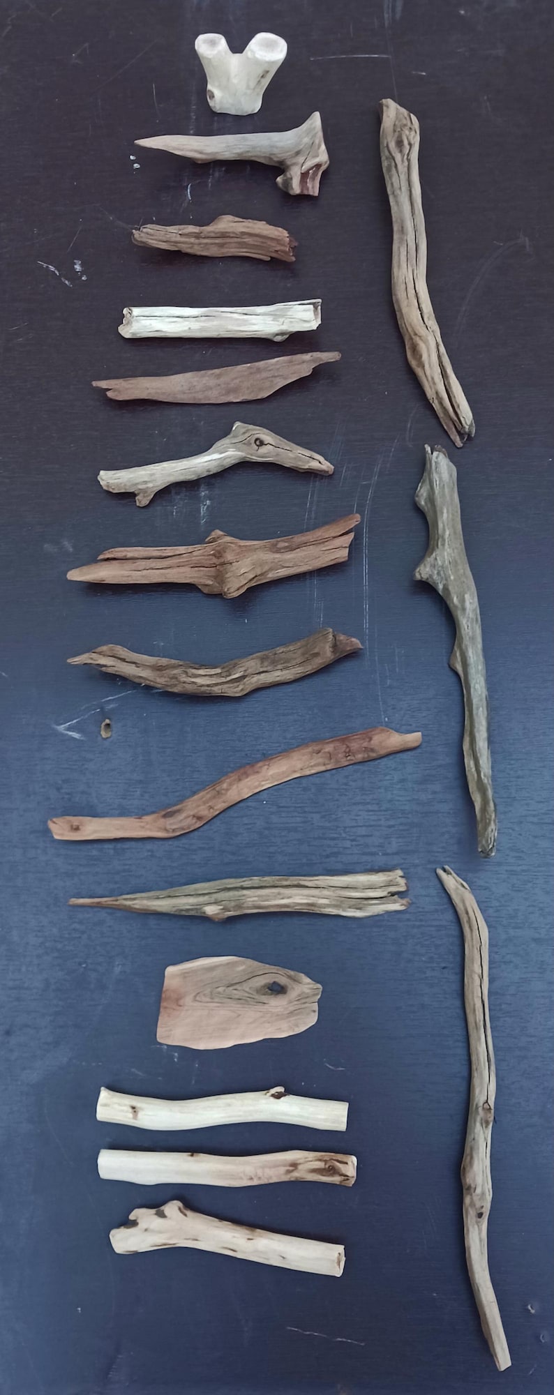 May include: A rustic wooden sign with the text "Welcome to our home" in a handwritten style. The sign features a distressed finish and a simple, inviting design, perfect for a front porch or entryway.