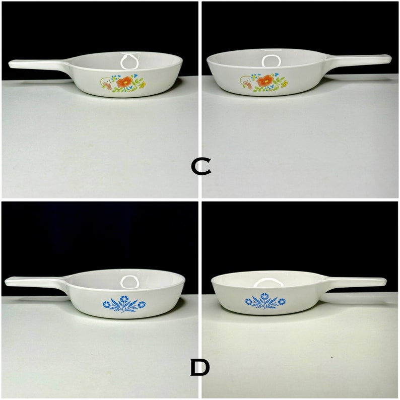 May include: Four white ceramic skillets with different floral designs. Two skillets feature a blue floral design and two skillets feature a multi-colored floral design.