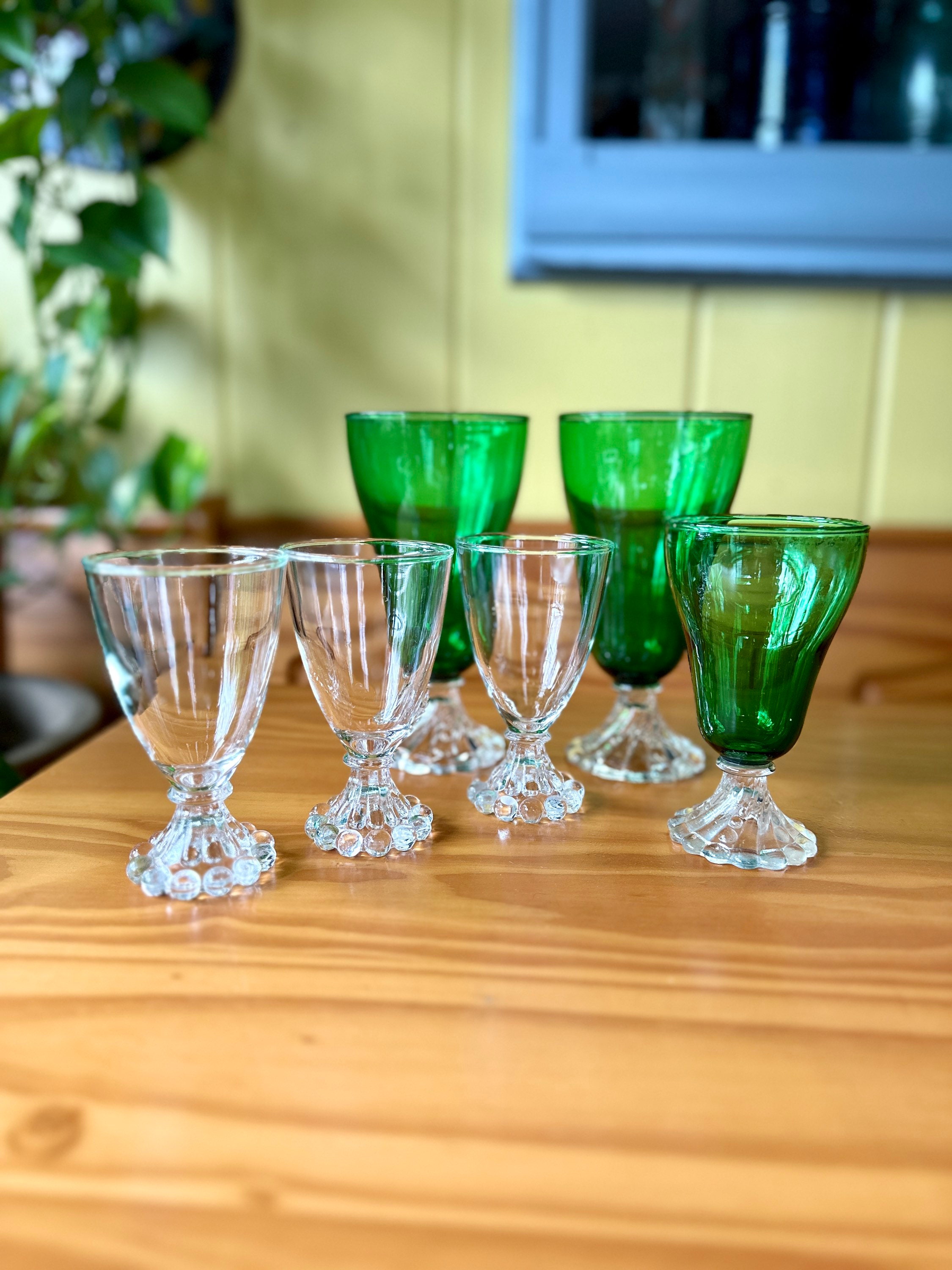Set of 2 hand blown clear green rim controlled bubble glass cups