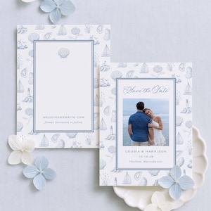 May include: Two rectangular save the date cards featuring a blue nautical pattern of sailboats, lighthouses, and seashells. One card displays a photo of a couple, the text Save the Date, Lousia & Harrison, 10.16.28, and Chatham, Massachusetts.