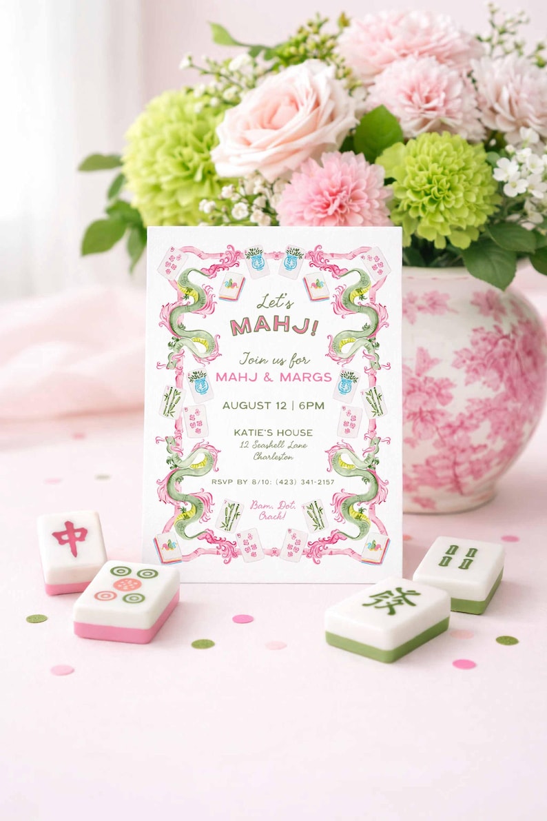 May include: An invitation card with the text "Let's MAHJI!" and a green dragon design. The card is surrounded by Mahjong tiles and a vase of pink and green flowers. The invitation includes the date, time, and location.