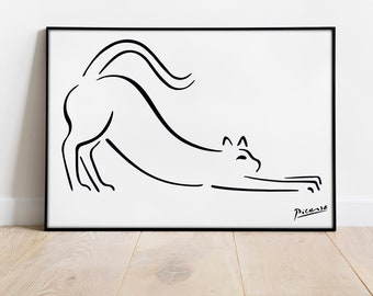 May include: Black and white line art print of a cat stretching, signed "Picasso" in the bottom right corner.