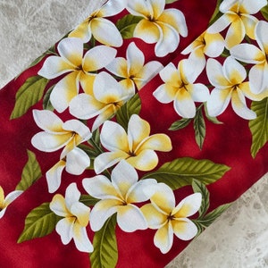 Hawaiian White Plumeria in Red Fabric by the yard