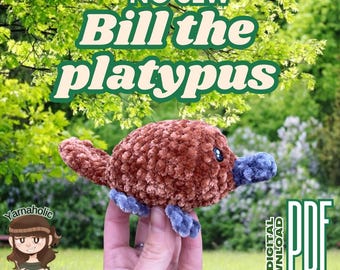 May include: No Sew Bill the Platypus crochet pattern. A brown and blue crocheted platypus plush toy is held in a hand. The pattern is a digital download in PDF format.