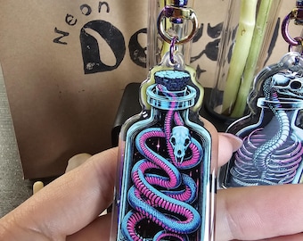 Neon Viper "The Alchemist I"- Double-Sided Epoxy Keychain with iridescent heart clasp, 2.5 inches