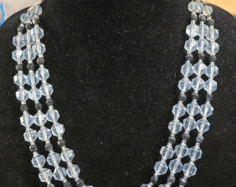 West Germany acrylic blue and black necklace and earrings.  Shortest strand measures 18 in.