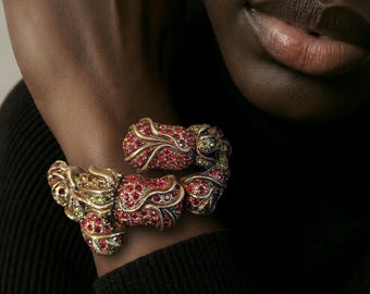 Heidi Daus clamper rose flowered rhinestone bracelet.