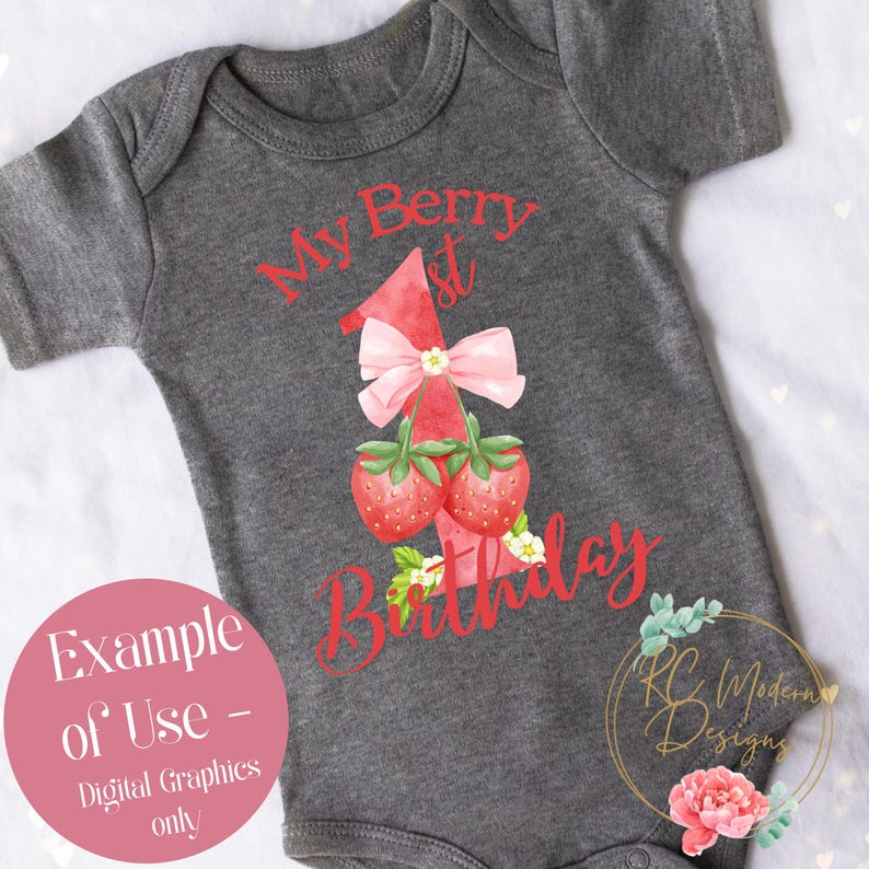 May include: A gray baby onesie with a red strawberry-themed design. The design includes a large number one, two strawberries, and the text "My Berry 1st Birthday". A pink bow and floral accents complete the design.