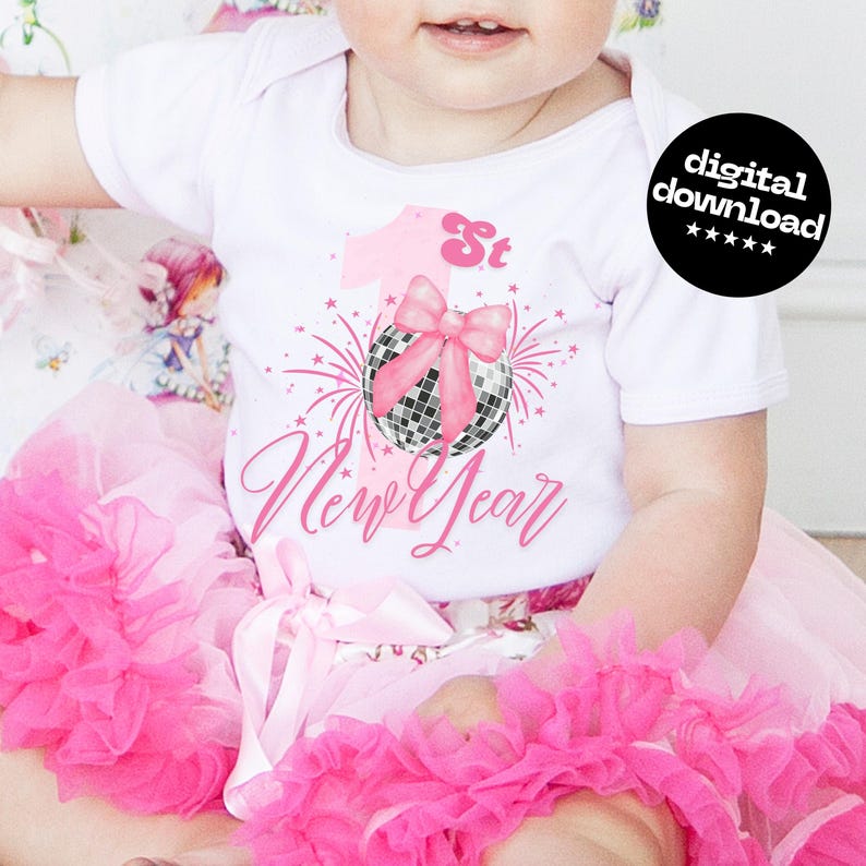 May include: A white baby bodysuit with a pink "1st New Year" design, featuring a disco ball, bow, and fireworks. The baby is wearing a pink tutu skirt with multiple layers of ruffles.