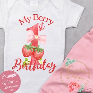 May include: White baby bodysuit with the text "My Berry 1st Birthday" in red script. The design includes a large number one with a pink bow and two strawberries. Pink pants are visible on the right.
