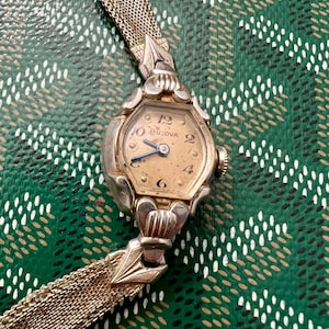 Ladies Bulova Vintage 10K Rolled Gold Plated Watch Estate Jewelry piece Runs Excellent Absolutely Beautiful from 1954