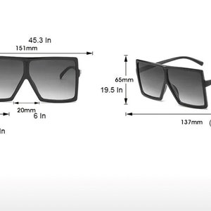 May include: Black square-shaped sunglasses with a gradient lens. The sunglasses measure 6.6 cm wide and 4.5 cm tall. The arms are 13.7 cm long.