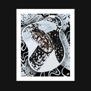 May include: A framed art print featuring a stylized illustration of a snake. The artwork uses a palette of black, white, and brown, with intricate patterns and details. The snake's head is prominently displayed, with a focus on its eye and scales.