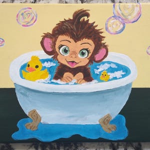 May include: A whimsical painting of a brown monkey in a blue bathtub with two yellow rubber duckies. The monkey has large green eyes and pink ears. Bubbles float in the air. The background is yellow and green.