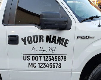 May include: White pickup truck with a black vinyl decal on the side door. The decal reads "YOUR NAME", "Brooklyn, NY", "US DOT 12345678", and "MC 12345678".