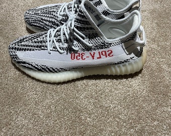 yeezy zebra baseball cleats