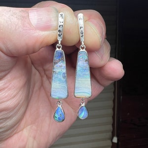 Make a summertime statement with these super fun Australian boulder opal earrings set in sterling silver with lever back closure.