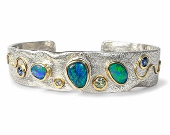 Lightning Ridge black opal, sapphires, diamond 22K, 18K, Sterling silver fire forged and textured cuff bracelet.