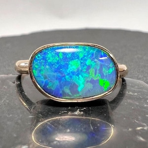 Gem Lightning Ridge Australian opal doublet 14k gold ring with exceptional brightness and play of color.
