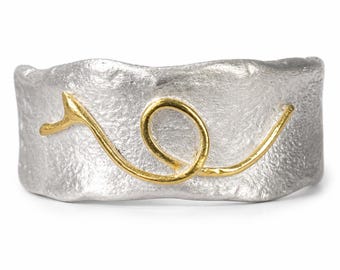 Sterling silver fire forged ring with 22K gold accents.