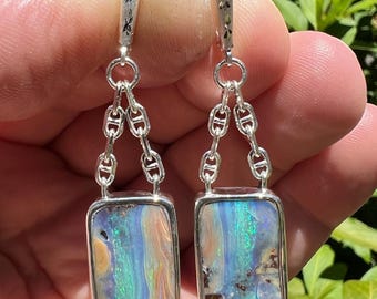 Boulder opal "waterfall" earrings set in sterling silver. Australian boulder opal dangle earrings with lever back closure.