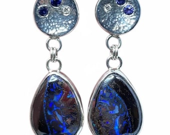Boulder opal drop earrings with sapphire and diamond accents in sterling silver.