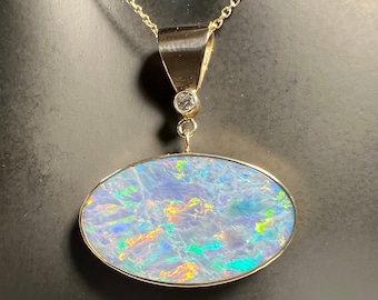 Australian Opal Pendant Bezel Set in 14K Gold with Diamond Accent.