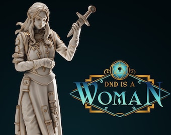 May include: A white painted figurine of a female character wearing armor and holding a sword. The figurine is standing on a white base. The background is a dark blue. The text "DND IS A WOMAN" is in a gold and blue banner.