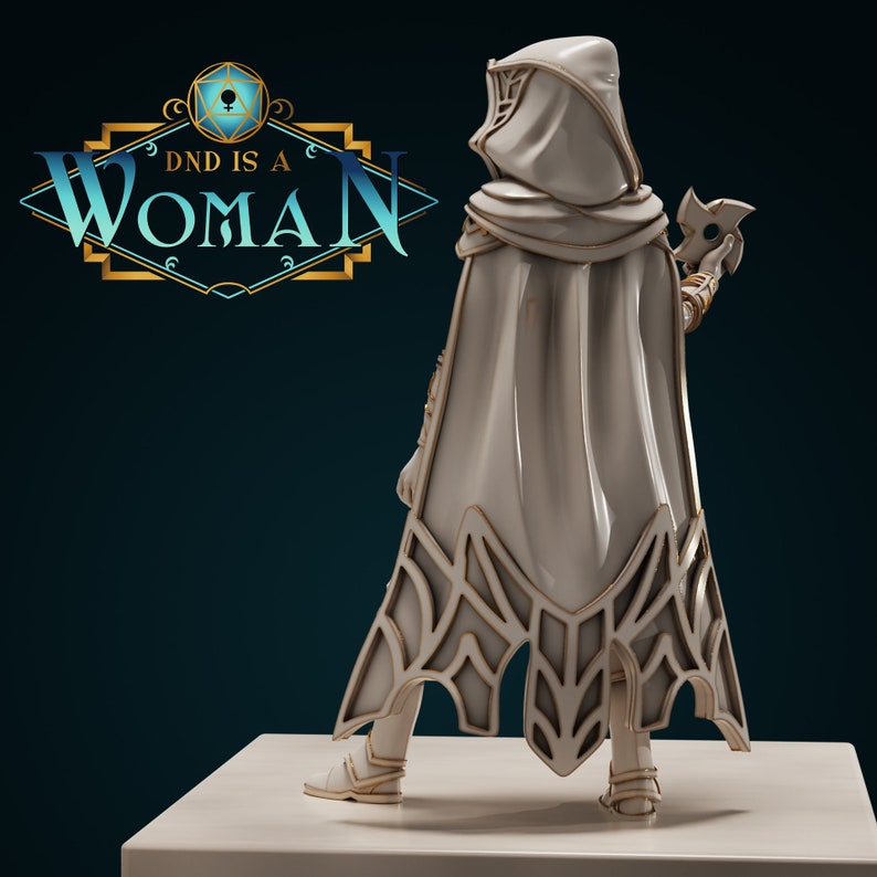 May include: A white figurine of a person wearing a hooded cloak with intricate gold detailing. The person is holding a throwing star in their right hand. The figurine is standing on a white base.
