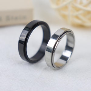 Op maat gegraveerde 6 mm zwart/zilveren stalen spinnerring, unisex ring, roestvrijstalen ring, spinnerring, aangepaste gegraveerde ring, cadeau voor haar hem