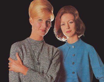 May include: Two women wearing cardigans. The woman on the left is wearing a gray and white cardigan with a V-neck and button closure. The woman on the right is wearing a blue cardigan with a round neck and button closure.