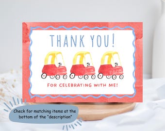 May include: A thank you card with a red border and blue wavy trim. The card features three red and yellow toy cars and the text "THANK YOU! FOR CELEBRATING WITH ME!"