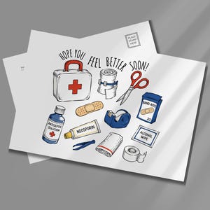 May include: A white postcard featuring the text HOPE YOU FEEL BETTER SOON! and illustrations of first aid supplies including a white medical kit, bandage roll, scissors, antiseptic solution, Neosporin tube, tape dispenser, band-aids, tweezers, and alcohol wipe.