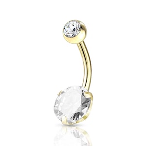 May include: Gold belly button ring with a clear round gem on the bottom and a smaller clear round gem on the top.