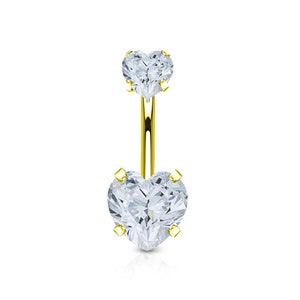 May include: Gold belly button ring with two clear heart-shaped cubic zirconia stones.