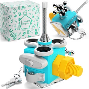 May include: A blue and yellow fidget toy with a spinning top, a silver key, and a silver spring. The toy is labeled "Jumble Dream".