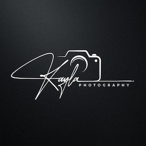 May include: A white graphic logo on a black background featuring the stylized cursive text Kayla integrated with a line-art camera icon. Below the camera, the word PHOTOGRAPHY is printed in a clean, sans-serif font with a horizontal line.