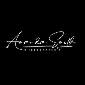 May include: White text on a black background reads "Amanda Smith Photography". The text is in a handwritten script font.