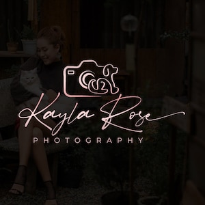 May include: A pink and white logo featuring a camera with a dog inside. The text "Kayla Rose Photography" is beneath the logo.