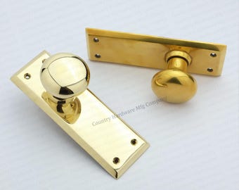 Unlacquered Brass Classic Dummy Door Knobs with Large Backplate