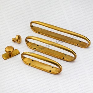Antique Unlacquered Brass Ellipse Handles